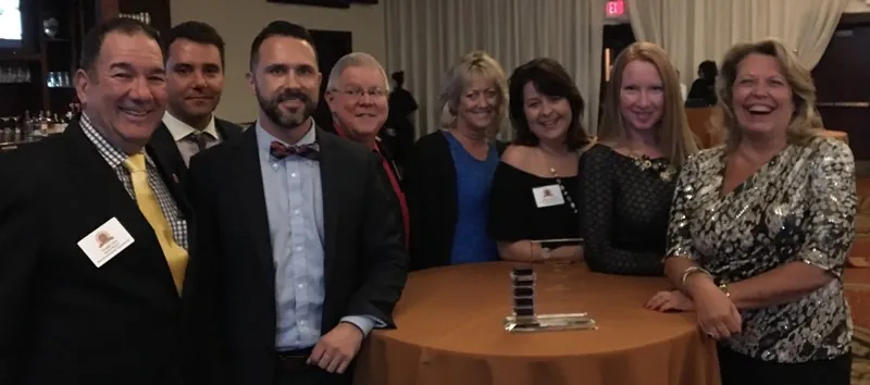 Ybor City Development Corporation receiving Planning and Design Award from Tampa-Hillsborough County Planning Commission