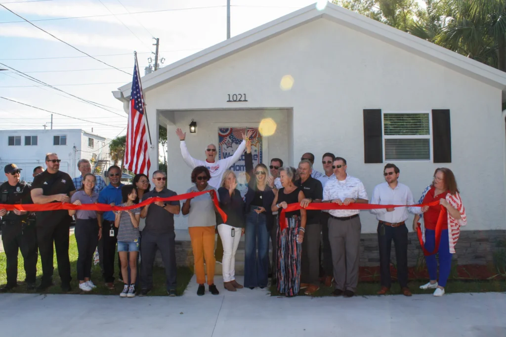 Ribbon-cutting ceremony celebrating the opening of Hessel House for a veteran family