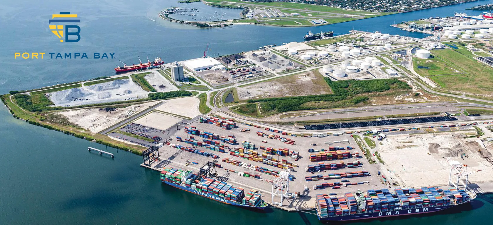Aerial view of Port Tampa Bay's port terminal with the Port Tampa Bay logo