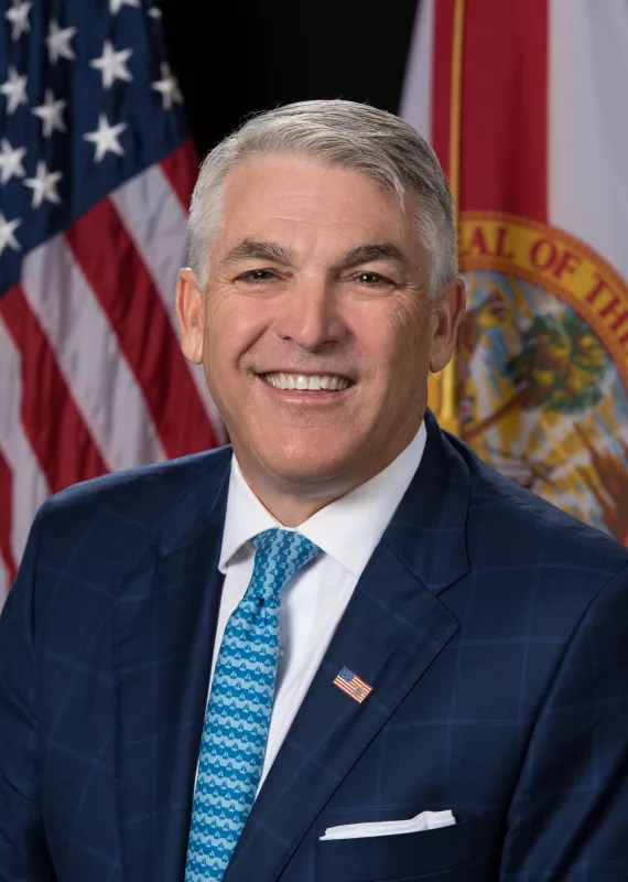 Paul Anderson, pictured in the Port Tampa Bay case study, with American and Florida flags