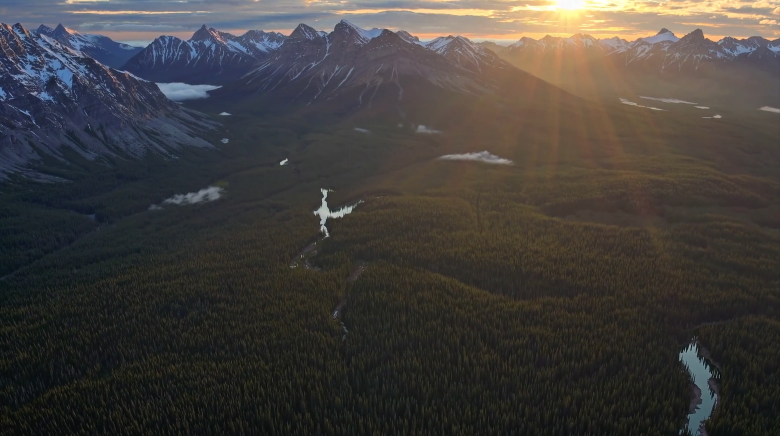 Aerial view of a mountain landscape at sunset
