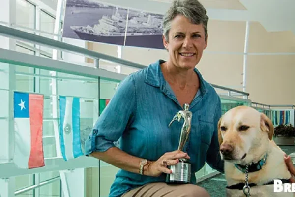 Brenda and Tibet, stars of The Courthouse Dog with their Telly Award