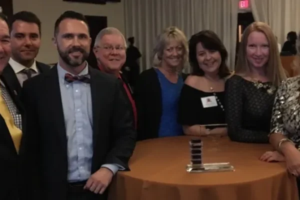 Ybor City Development Corporation receiving Planning and Design Award from Tampa-Hillsborough County Planning Commission