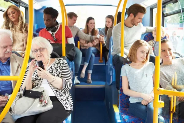 Passengers riding a public transit bus