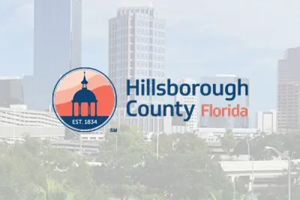 Hillsborough County, Florida seal over the Tampa skyline