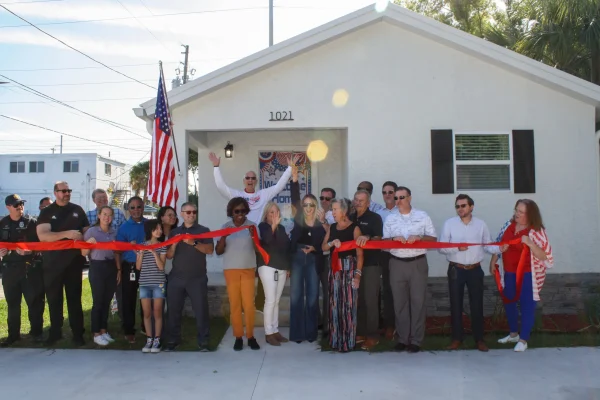 Ribbon-cutting ceremony celebrating the opening of Hessel House for a veteran family