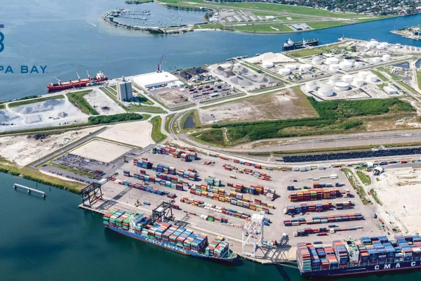 Aerial view of Port Tampa Bay's port terminal with the Port Tampa Bay logo