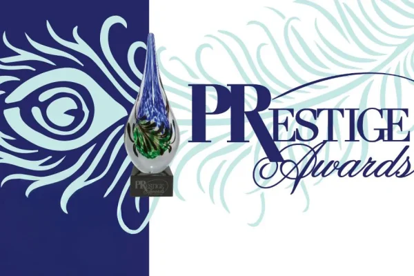 PRSA Prestige Awards graphic with a peacock feather design
